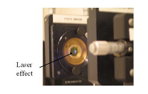 
   
    Figure E9: Photo of the output mirror during the laser effect. The focal point is invisible to the naked eye but can be detected by a digital camera
   
  